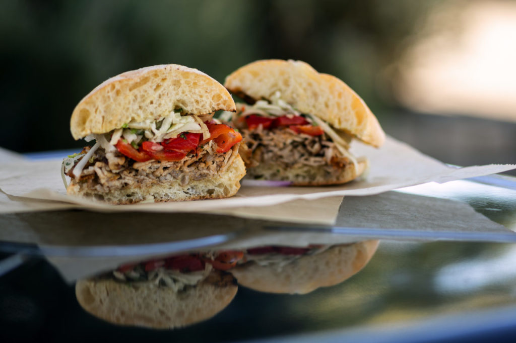  Grilled Italian Pork House made porchetta, garlic aioli, roasted peppers, fennel red onion slaw, Village Bakery ciabatta roll