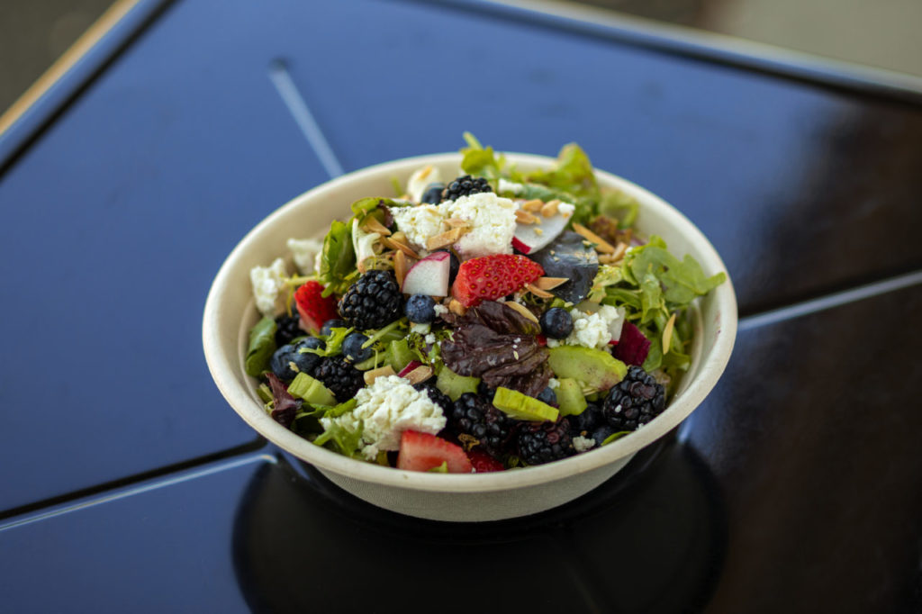 Zoftig's Mo'Berry Blues Salad with strawberries, blueberries, blackberries, radish, roasted beets, cucumbers, toasted almonds, goat cheese, FEED mixed greens and champagne vinaigrette in Santa Rosa. (Chris Hardy/For Sonoma Magazine)