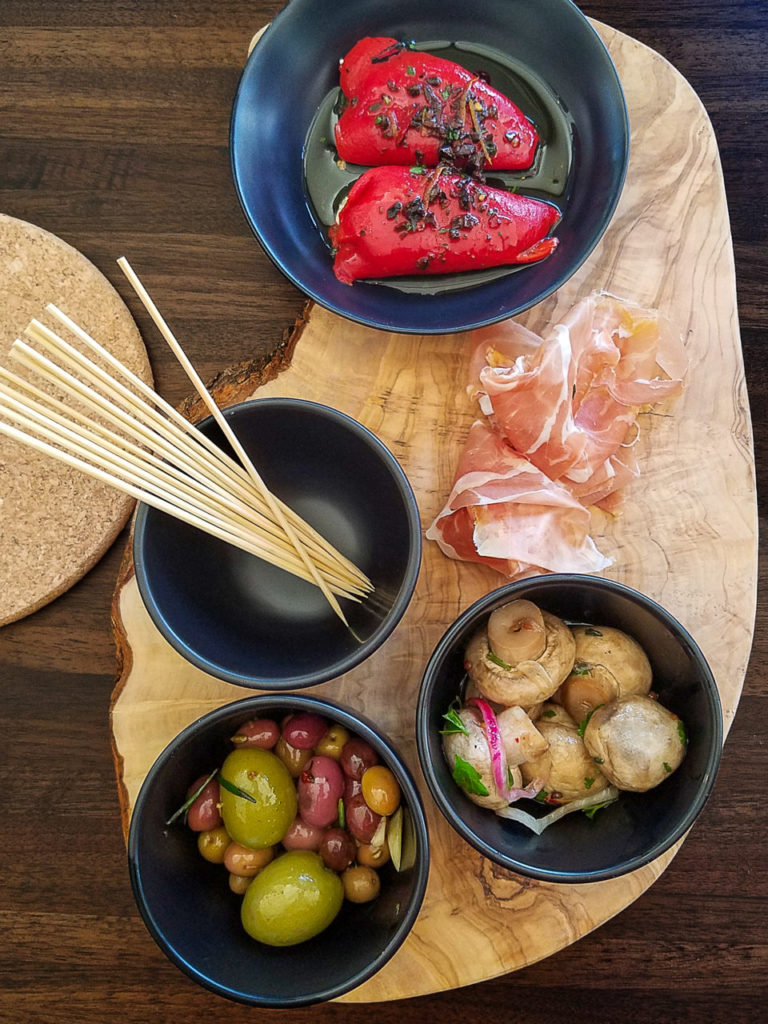 Pintxo of goat cheese-stuffed red peppers, jamon, pickled mushrooms and olives at Gerard’s Paella y Tapas in Santa Rosa. Heather Irwin/PD.