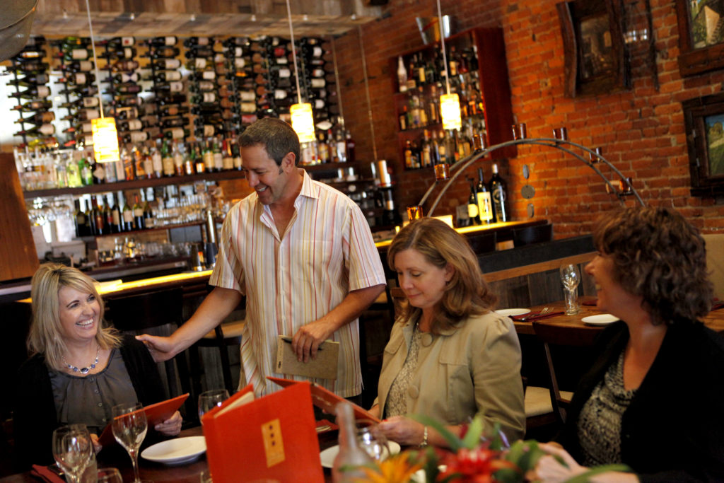 8/5/2012: D4: PC: Owner Marco Palmieri talks with customers at Risibisi Restaurant in Petaluma, California on Monday, July 30, 2012. (BETH SCHLANKER/ The Press Democrat)
