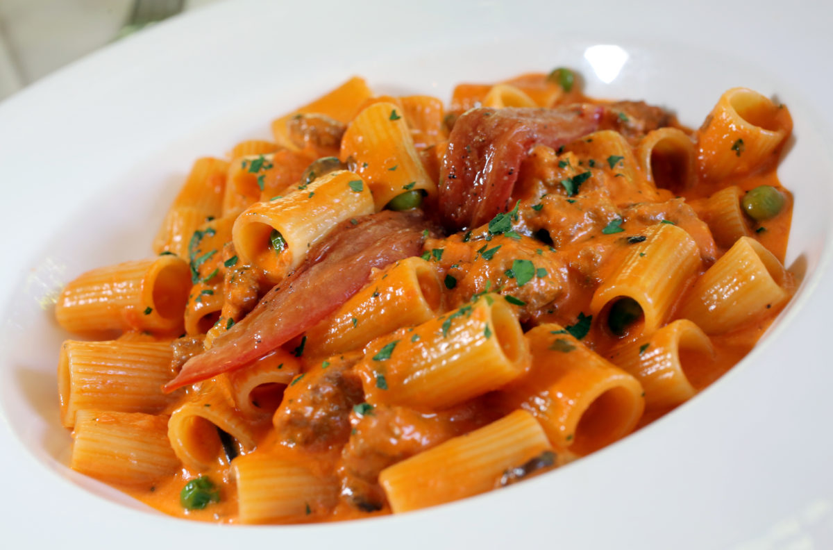 Ca'Bianca's Rigatoni served with Italian sausage, peas, mushrooms, tomato and cream sauce. (Crista Jeremiason/The Press Democrat)