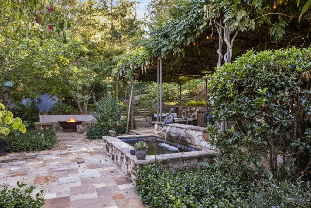 An outdoor patio and water fountain at the bungalow at Flambeaux Wine in Healdsburg. (Flambeaux Wine)