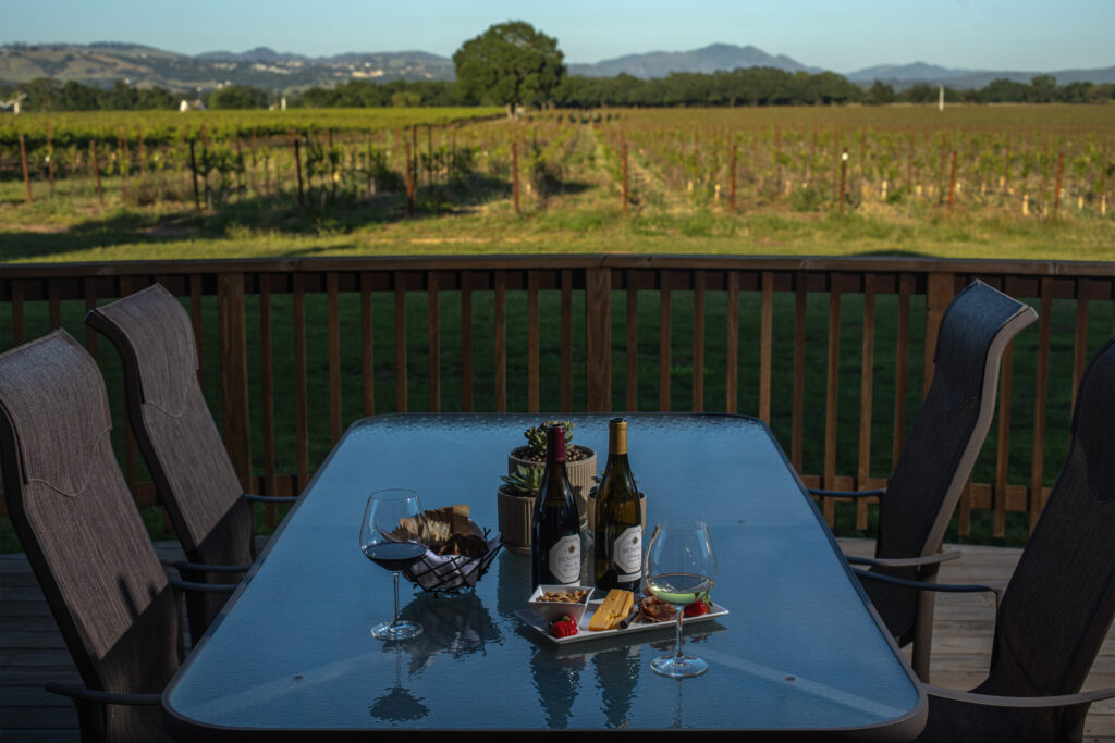 A deck overlooking the vineyards at Benovia Winery's Chardonnay Cottage in Santa Rosa. (Chad Surmick)