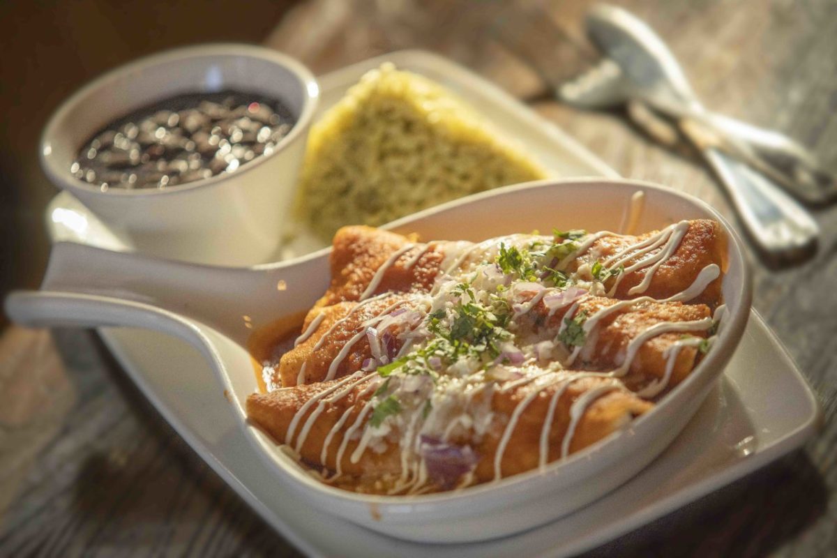Chicken Tinga Enchiladas Roja with cream, red onion, cilantro, quest fresco chars beans from Cascabel Mexican Bar & Grill in Santa Rosa. (photo by John Burgess/The Press Democrat)