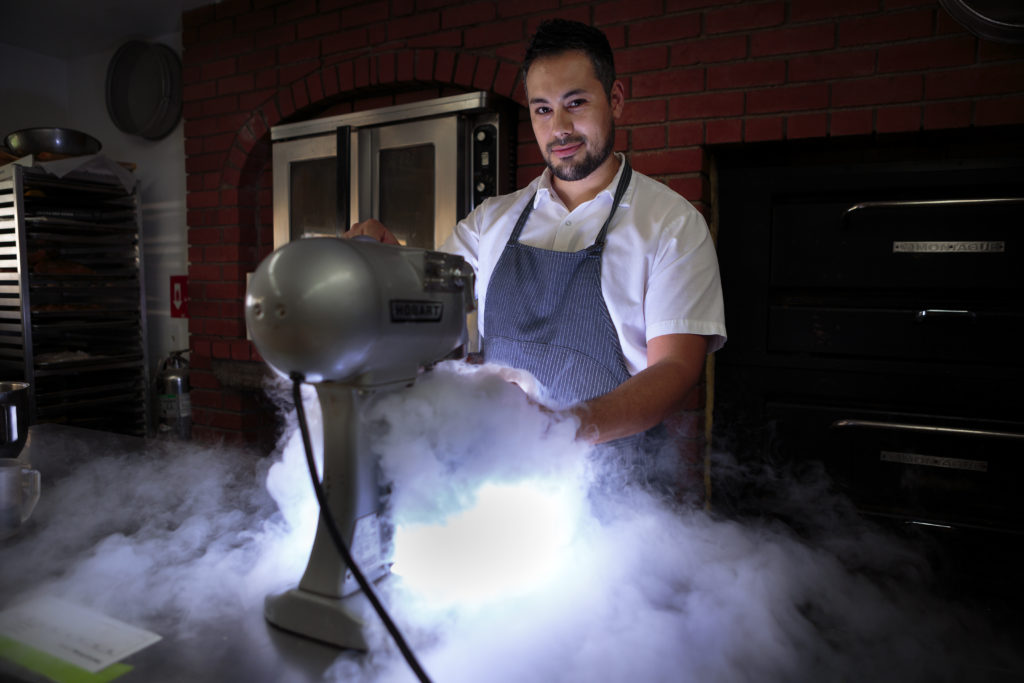 Six pastry chefs and their signature dish Manny Fimbrez, Madrona Manor, Working with liquid nitrogen in the kitchen +ÒPeas and a PodÓ Ð a strawberry tart with a pulled-sugar pea pod filled with lemon ganache and rolled in pea powder.