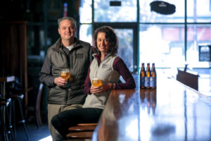 Natalie and Vinnie Cilurzo, of Russian River Brewing at their brew pub in Santa Rosa with Sonoma Pride beer they are brewing to help fire victims