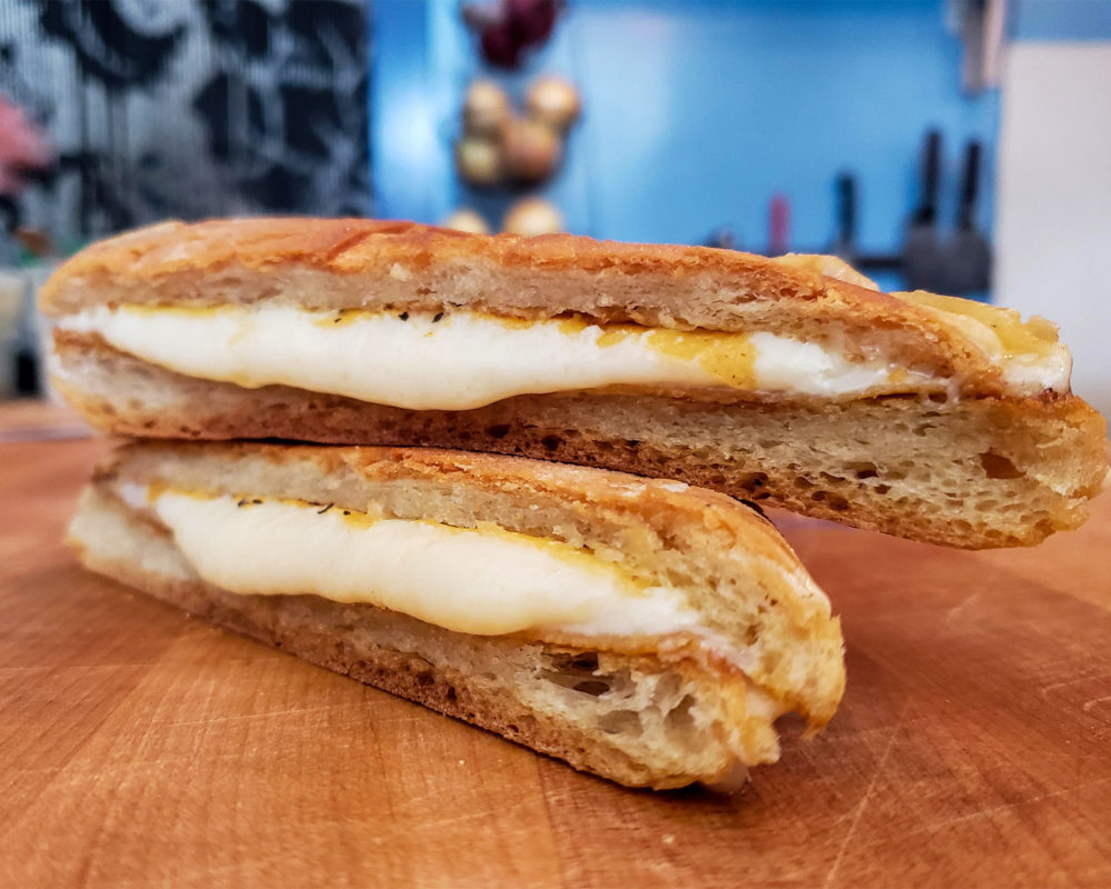 Popi’s Flaming Cheese at Yia Yia - The Grateful Greek in Penngrove. (Photo by Heather Irwin)