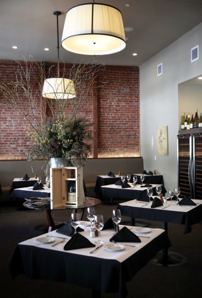 6/29/2014:D4: The new, expanded dining room at K&L Bistro in Sebastopol. The north wall has been knocked out and the new space holds 13 freestanding and banquette tables. PC: The new dining room at K&L Bistro in Sebastopol, on Tuesday, June 24, 2014.(BETH SCHLANKER/ The Press Democrat)