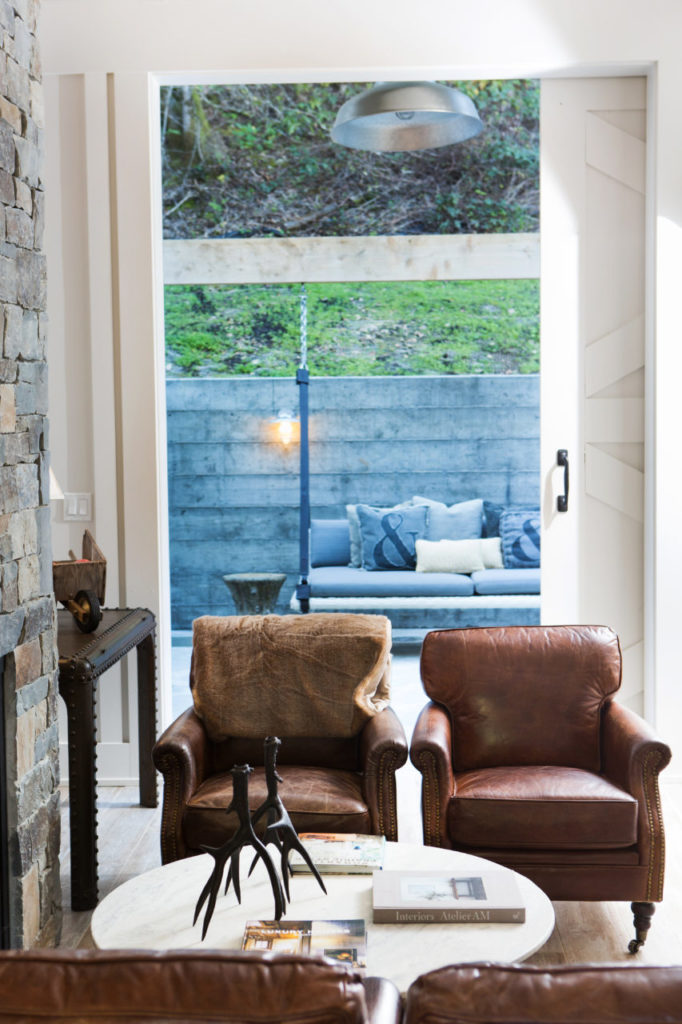 The new spa at the Farmhouse Inn has a lobby which includes four lounge chairs, a gas fireplace and opens to a back porch with swing and lockerroom. Farmhouse is now ranked by Travel and Leisure Magazine as the fourth best inn in America, and is number 28 on its WorldÕs Best Hotels list. Shot on Friday, February 20, 2015 at Farmhouse Inn in Forestville, Calif. (Photo by Charlie Gesell for the Sonoma magazine)