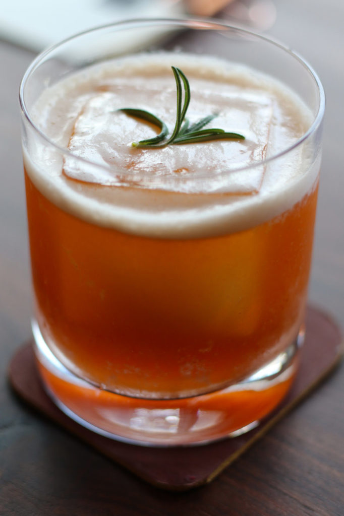 Westucky cocktail with date-infused bourbon, rosemary tea, cara cara, rabarbaro, orange bitters at Drawing Board Restaurant in Petaluma. (Heather Irwin/ The Press Democrat)