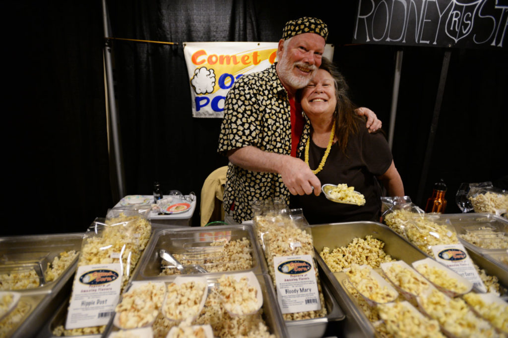 Jeff Phillips, left, and Sherry Soleski serving up their Comet Corn popcorn during Pick of the Vine wine tasting and auction gala held at the Luther Burbank Center for the Arts in Santa Rosa, Saturday. The event benefits Senior Advocacy Services. April 30, 2016. (Photo: Erik Castro/for The Press Democrat)