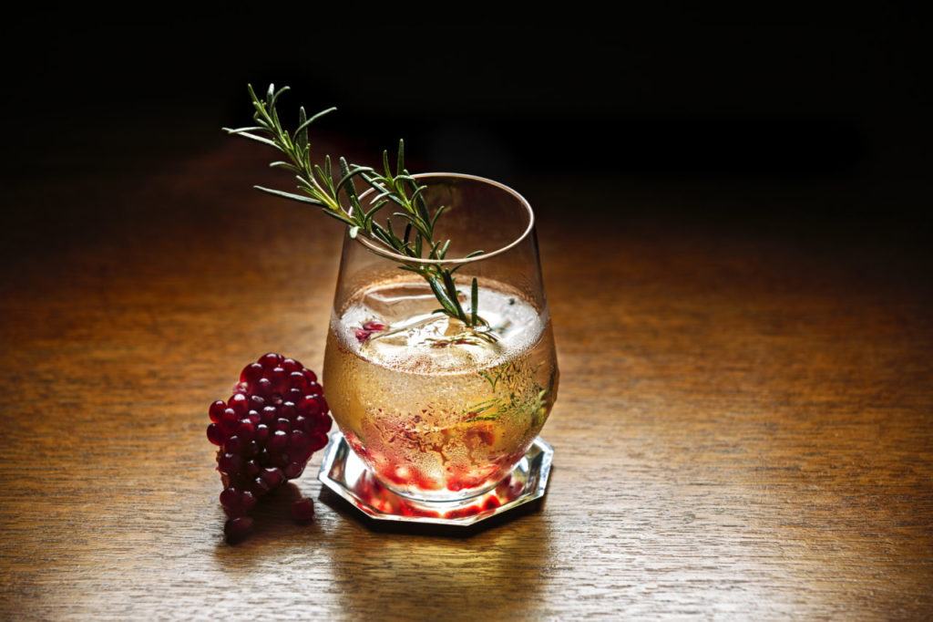 Winter cocktails Jardesca Holiday Spritz Jardesca, a lovely aperitif-intended spirit, combines sweet and dry white wines from California with a proprietary eau-de-vie thatÕs double-distilled into a fortified wine. A gardenÕs worth of botanicals are added, bottling it into a distinctively pretty package. Intended to work alone on the rocks, it also works as a mixer, bringing in bright citrus overtones with its aromas of peppermint, orange blossom and cardamom. A fistful of botanicals, left to the imagination, add additional complexity of flavor. In winter, it works with bubbles and fruits of the season to give lift to any glass. 3 ounces Jardesca over ice in a stemless wine glass 1 teaspoon fresh pomegranate seeds and/or juice Top with 1 ounce of sparkling wine garnish with rosemary sprig