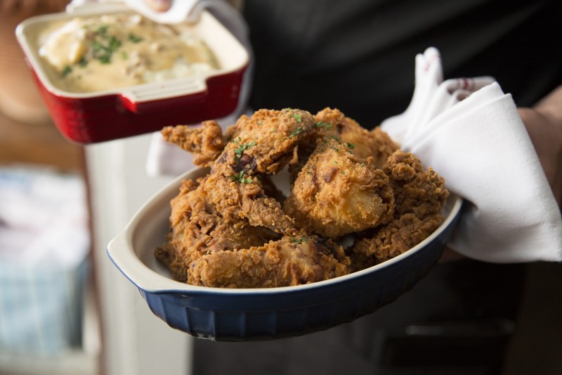 Fried Chicken Dinner from Backyard in Forestville. This chicken dinner is a winner, served with braised collard greens, buttermilk biscuits, and honey butter. 6566 Front St, Forestville CA, 707-820-8445, backyardforestville.com (Photo Courtesy of Backyard Forestville)