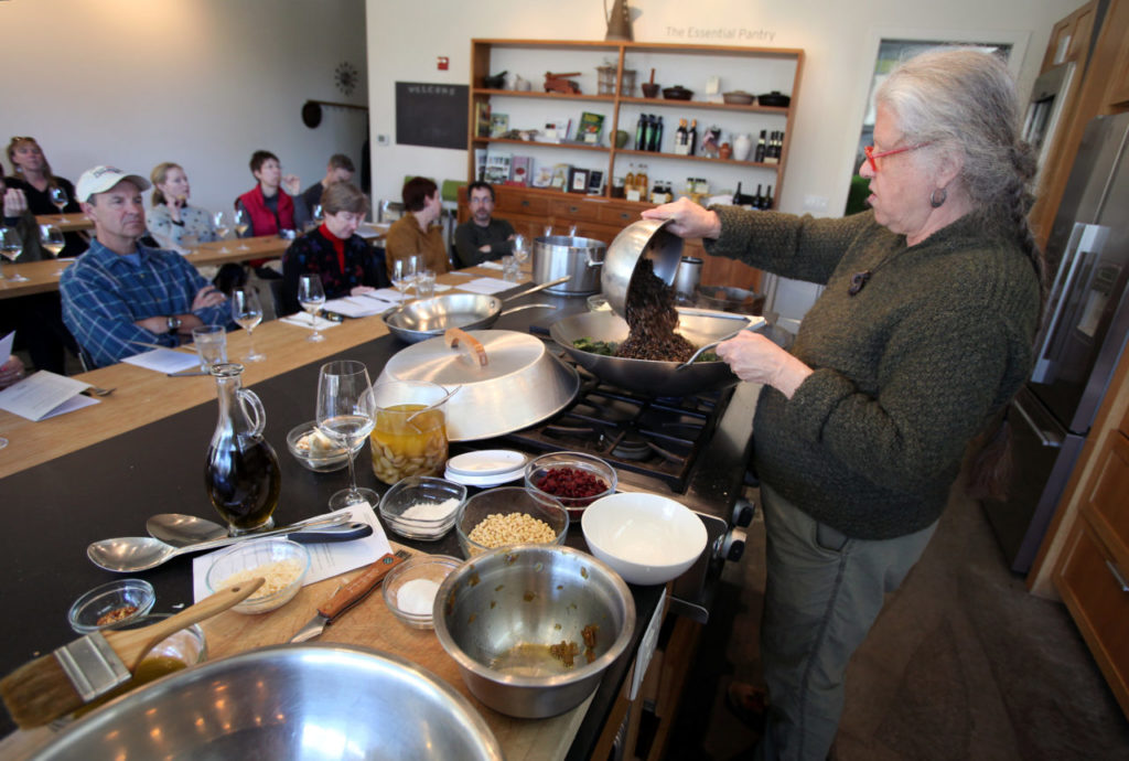 Elissa Rubin-Mahon prepares a wild rice with black trumpet mushrooms, pine nuts, carmelized onions, dried cranberries and kale dish at Relish Culinary Adventures in Healdsburg, on Sunday, January 20, 2013. (Christopher Chung/ The Press Democrat)