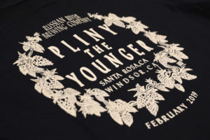 This year's Pliny the Younger logo printed on a work shirt. (Christopher Chung/ The Press Democrat)