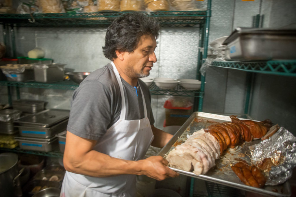 Chef Mateo Granados works in his Healdsburg kitchen Saturday, June 25, 2016. Mateo's Cocina Latina is beginning to offer sustainable feasts that include every part of the animals butchered for the dinner, including suckling pig brain mousse and pigs tails. (Jeremy Portje / For The Press Democrat)