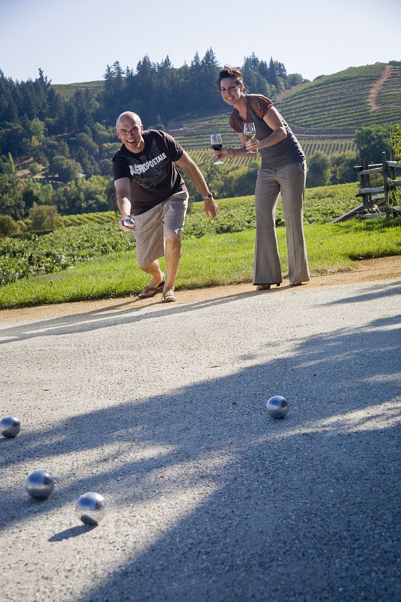 players on petanque court at Dutcher Crossing
