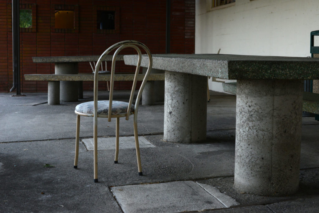 Cement picnic tables and seating just outside the Eldridge Store on Walnut Street, Eldridge, California. June 29, 2015. (Photo: Erik Castro/for Sonoma Magazine)