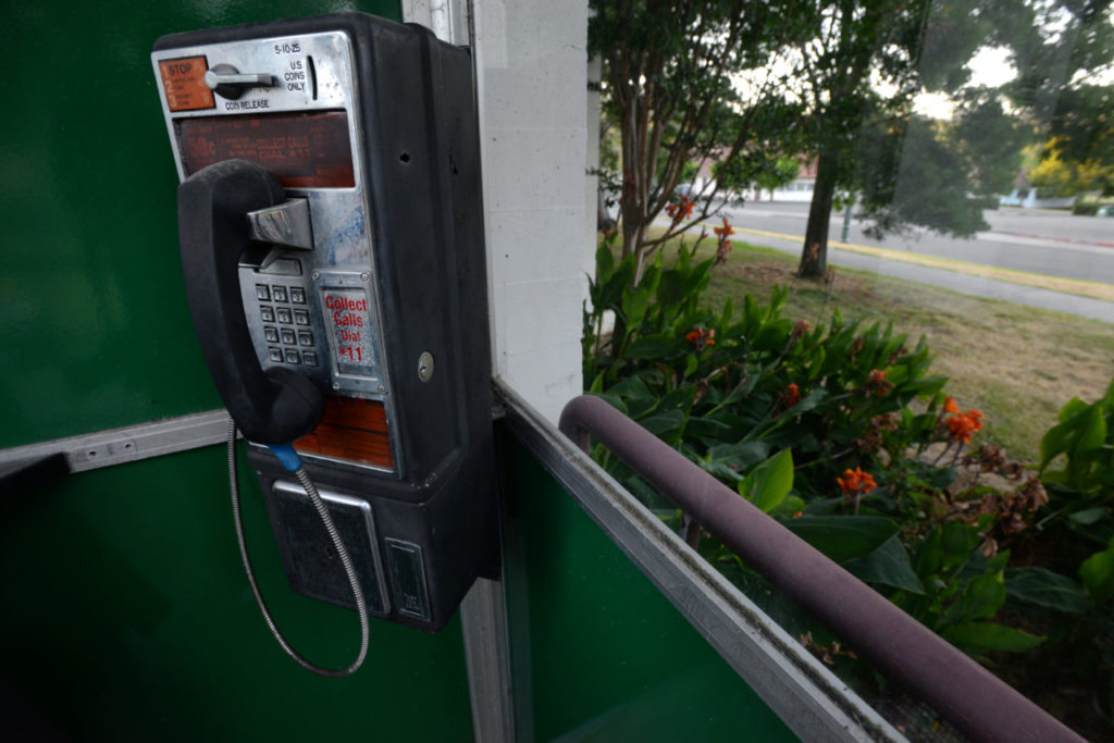An old telephone booth with a disconnected telephone located near the Eldridge Store on Walnut Street, Eldridge, California. June 29, 2015. (Photo: Erik Castro/for Sonoma Magazine)
