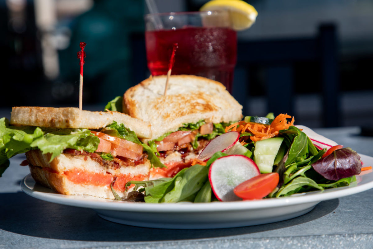 The smoked salmon BLT - that heavenly union of pig and fish between two slices of toast - served with fresh salad and hibiscus tea at Trinks in Gualala. (photo: John Beck/for Sonoma Magazine)