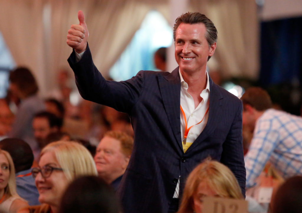 Lt. Gov. Gavin Newsom gives auctioneer Fritz Hatton a thumbs up during Auction Napa Valley at Meadowood Resort in St. Helena on Saturday, June 3, 2017. (Alvin Jornada / The Press Democrat)