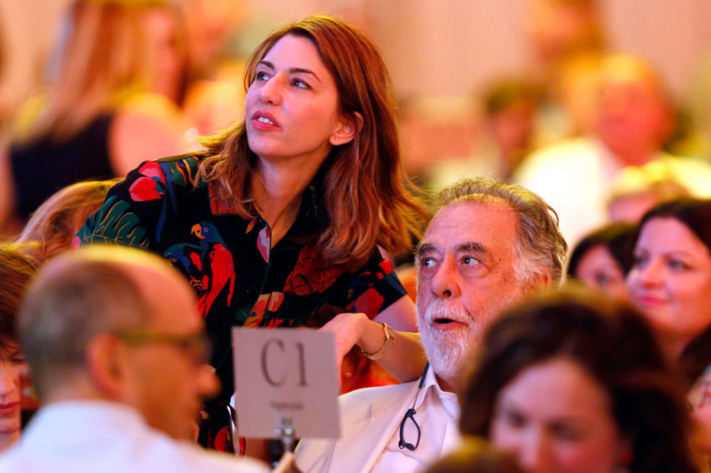 Sofia Coppola and her father Francis Ford Coppola watch the bidding action from their seats during Auction Napa Valley at Meadowood Resort in St. Helena, California on Saturday, June 3, 2017. (Alvin Jornada / The Press Democrat)