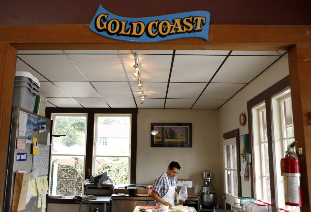 Luis Algredo bakes fresh pizza at Gold Coast Coffee and Bakery in Duncans Mills on Tuesday, Sept. 13, 2011. (Beth Schlanker / The Press Democrat)