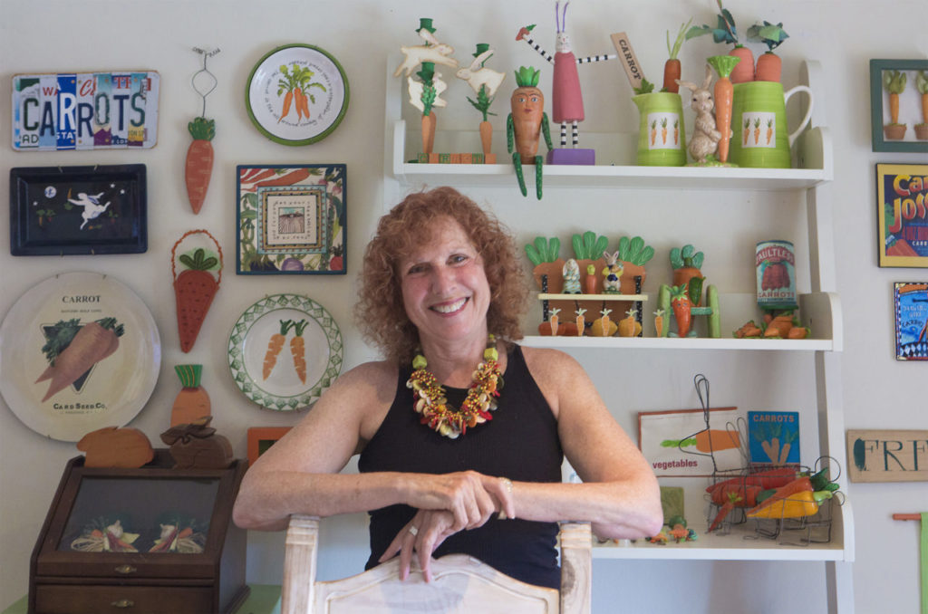 Heidi Geffen, proprietor of Tiddle E. Winks, Vintage 5 & Dime, on East Napa St., with her collection of things carrot.(Photo by Robbi Pengelly/Index-Tribune)