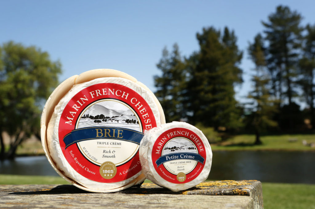 Marin French Cheese Company's triple creme brie is shown with it's new logo on Thursday, May 23, 2013. The company is making several upgrades, including a rebranding. (Conner Jay/The Press Democrat)
