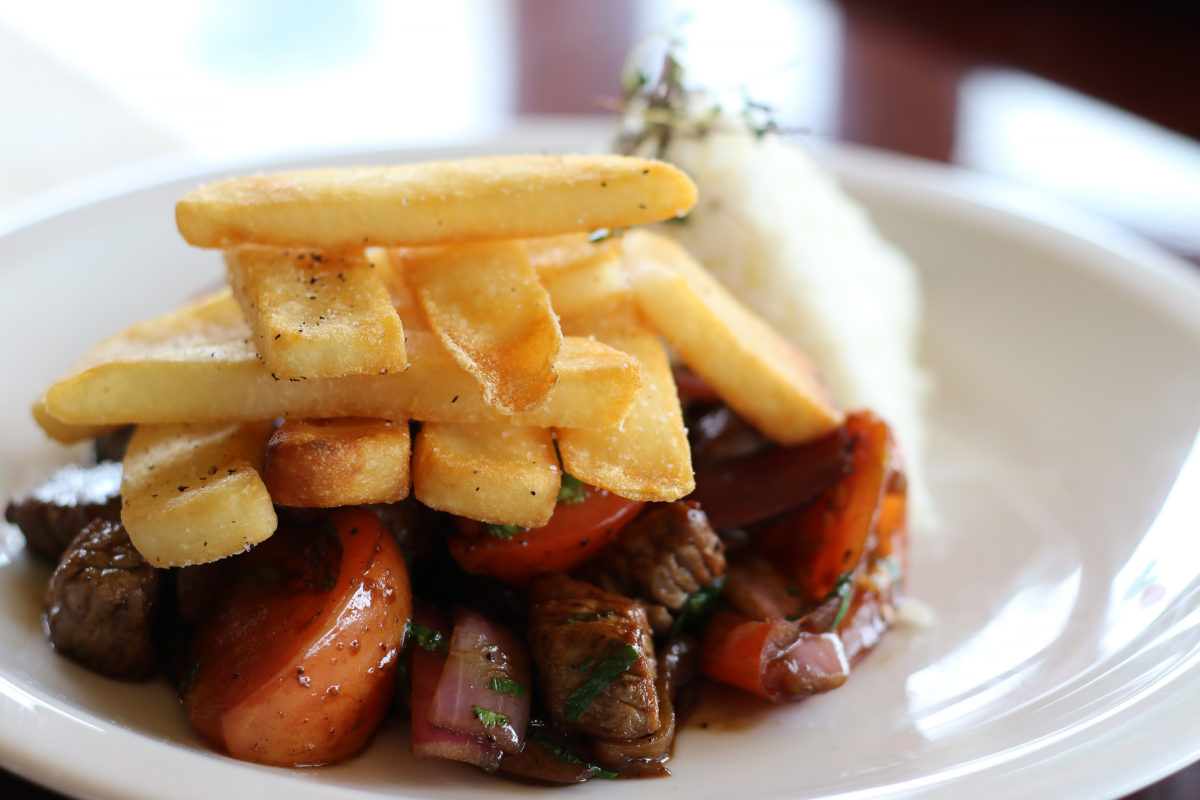 Lomo saltado (steak and fries) Peruvian style at Quinua Cocina Peruana in Petaluma. (Heather Irwin/Sonoma Magazine)