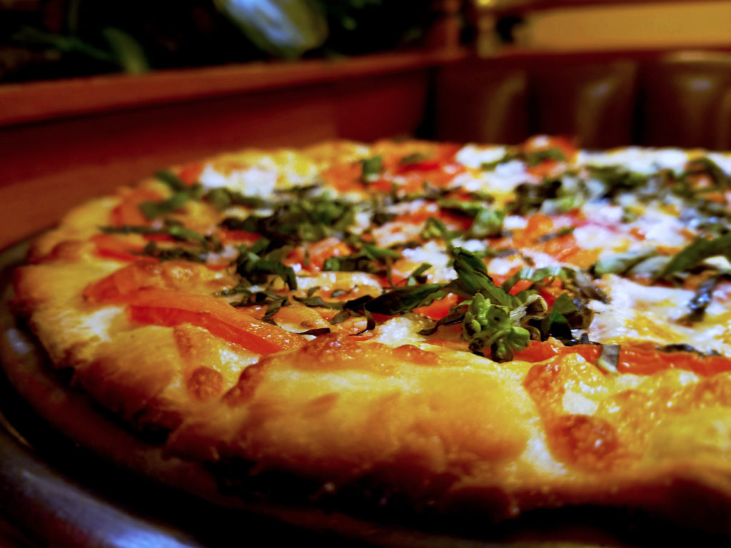 Italian style pizza with basil, tomatoes, olive oil and mozzarella at La Vera restaurant in Santa Rosa. Heather Irwin/PD