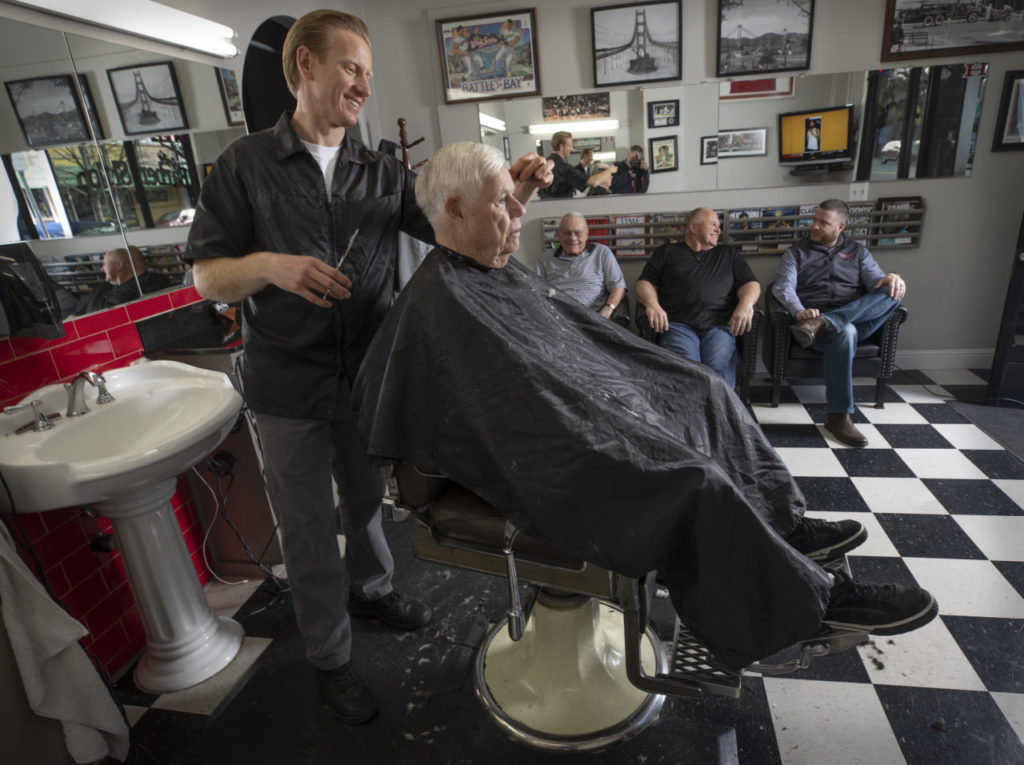 Erik's Barbershop in Healdsburg cuts the hair of Duane Hermon, who opened his first barber shop on Healdsburg Ave in 1958. (photo by John Burgess/The Press Democrat)