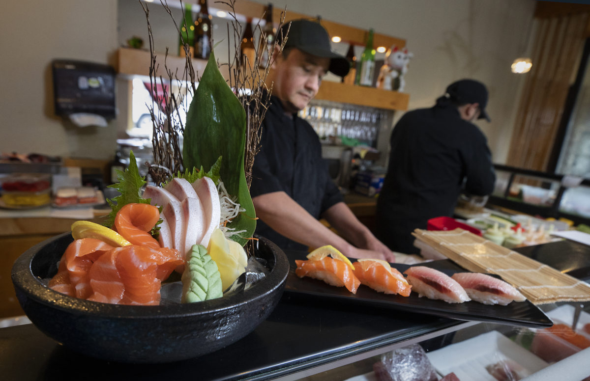 Edwardo Tejeda creates sushi platters at Ume Japanese Bistro in Windsor. (John Burgess/The Press Democrat)