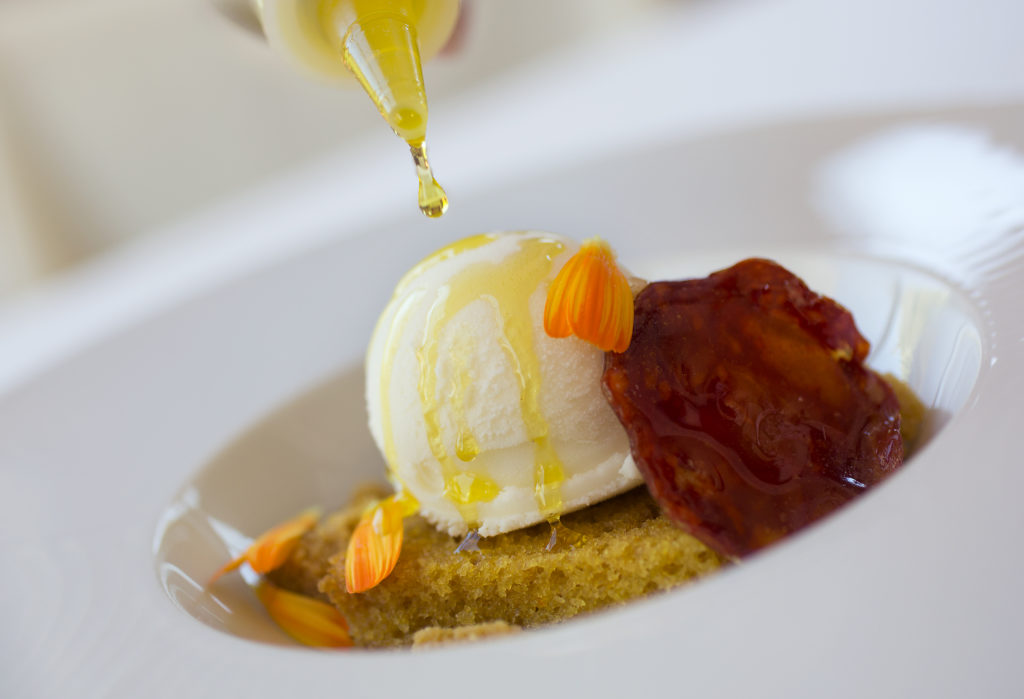 Atypical Couvert, olive oil cake, queijo fresco ice cream, candied chourio with a drizzle of olive oil from chef Chef Manuel Azevedo at La Salette in Sonoma. (John Burgess/The Press Democrat)