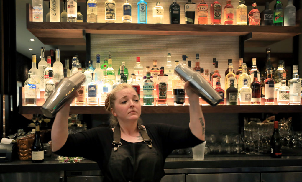 Sweet T's bartender Missy Lorenzen mixes drinks, Monday, March 4, 2019 during a soft opening of the restaurant's new location in Windsor. Sweet T's was destroyed during the Tubb's fire as it roared over Fountaingrove and in to Santa Rosa. (Kent Porter / The Press Democrat) 2018