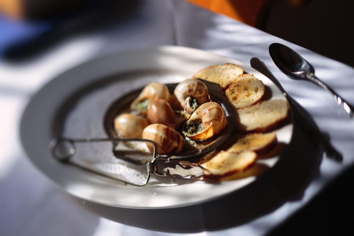 Escargot and crustini from La Gare restaurant in Santa Rosa. (Chris Hardy/For Sonoma Magazine)