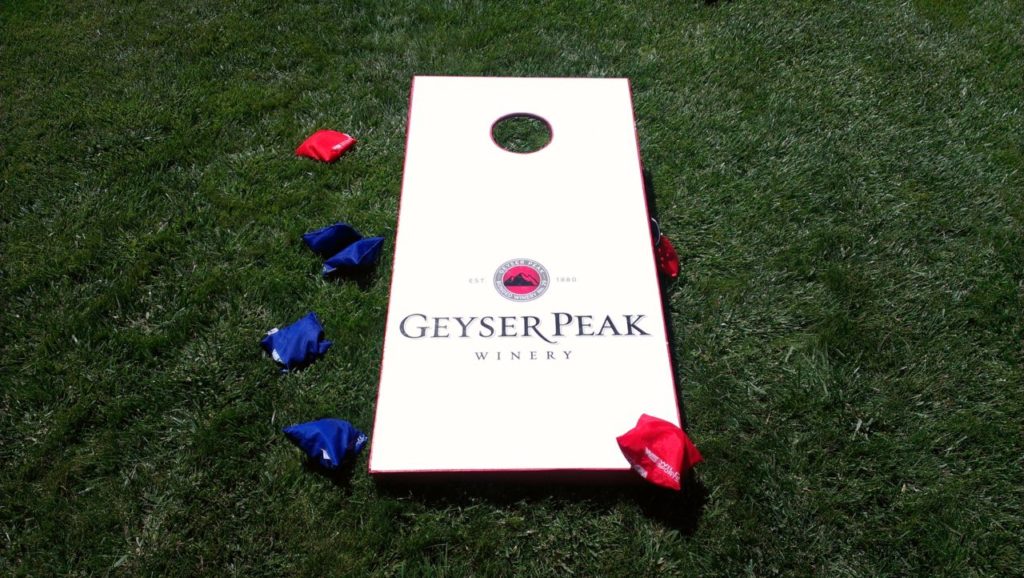 Geyser Peak Winery: Since moving to Dry Creek Valley a few years ago, Geyser Peak has embraced the community fully, and become an favorite Passport stop. This under-the-radar gem will impress with their Celebrate the Sea theme, featuring cioppino by Chef Ken Rochioli, music from Sonoma County band Junk in the Trunk, a dance floor, and places to lay out a beach blanket and soak up the sun. (Photo Credit: Chelsea Kurnick)