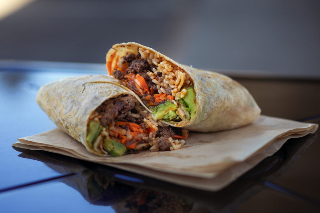 Fancy Fast Food Zoftig Korean Burrito Marin sun Farms ground beef marinated with soy, brown sugar, garlic and ginger, Korean BBq sauce, avocado, mint cilantro, pickled daikon and carrot, organic brown rice, kimchi