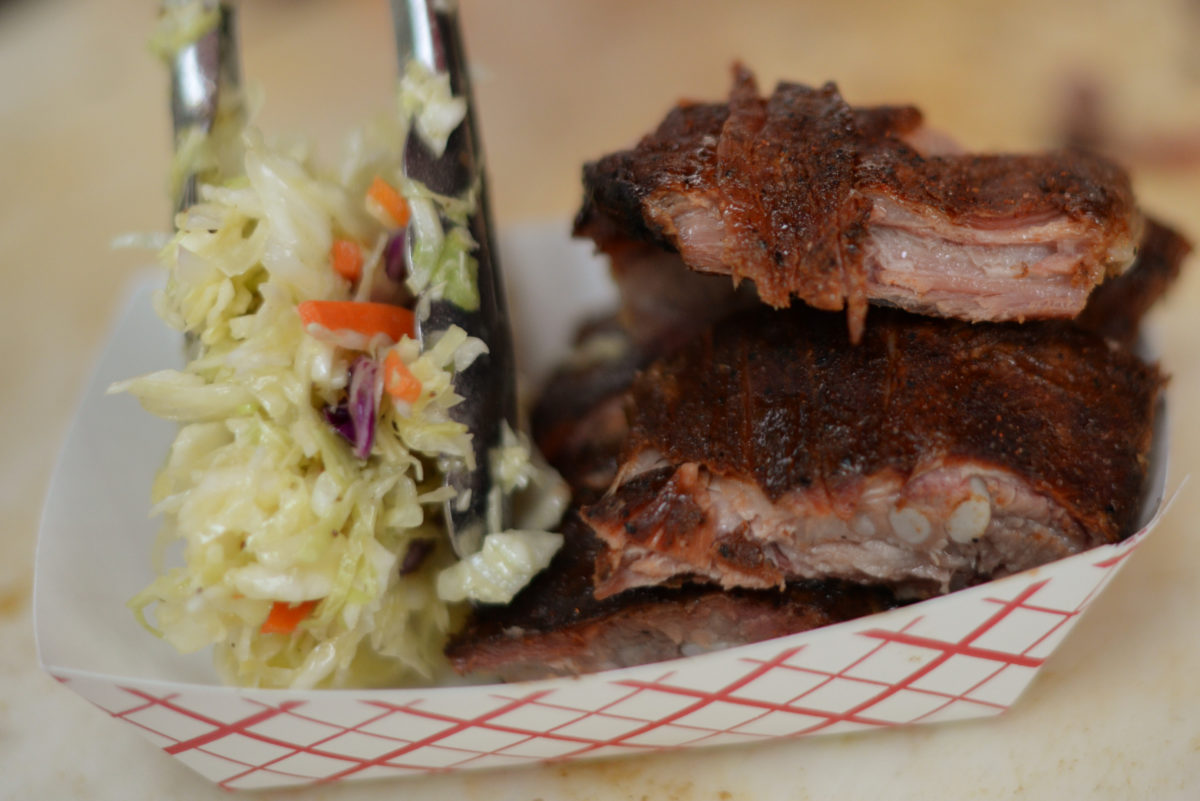 BBQ Smokehouse Bistro & Catering pork ribs and coleslaw being served during the 22nd annual Sonoma County Cajun Zydeco & Delta Rhythm Festival held Saturday at Ives Park in Sebastopol. September 2, 2017. (Photo: Erik Castro/for The Press Democrat)