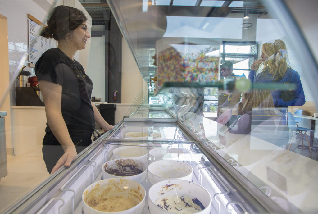 Jacqueline Ulloa, who owns the ice cream shop Cielito with her husband, hands out samples. (Photo by Robbi Pengelly/Index-Tribune)
