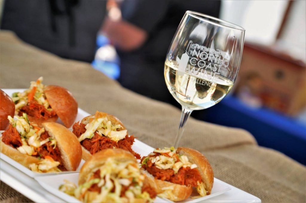 Chili braised pork shoulder sliders on brioche with Napa cabbage slaw by chef Crista Luedtke of boon eat + drink at The Press Democrat’s North Coast Wine & Food Festival at SOMO Village in Rohnert Park, Saturday, June 10, 2017. (Will Bucquoy)