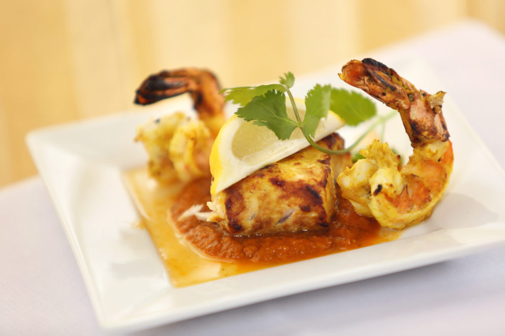 Mixed Seafood Tikka Kebab with marinated tandoori grilled fish and jumbo prawns is served at Pamposh Restaurant in Santa Rosa. 7/21/2013: D3: PC: Mixed Seafood Tikka Kebab with marinated tandoori grilled fish and jumbo prawns is served at Pamposh Restaurant in Santa Rosa on Tuesday, July 16, 2013. (Photo by Conner Jay)