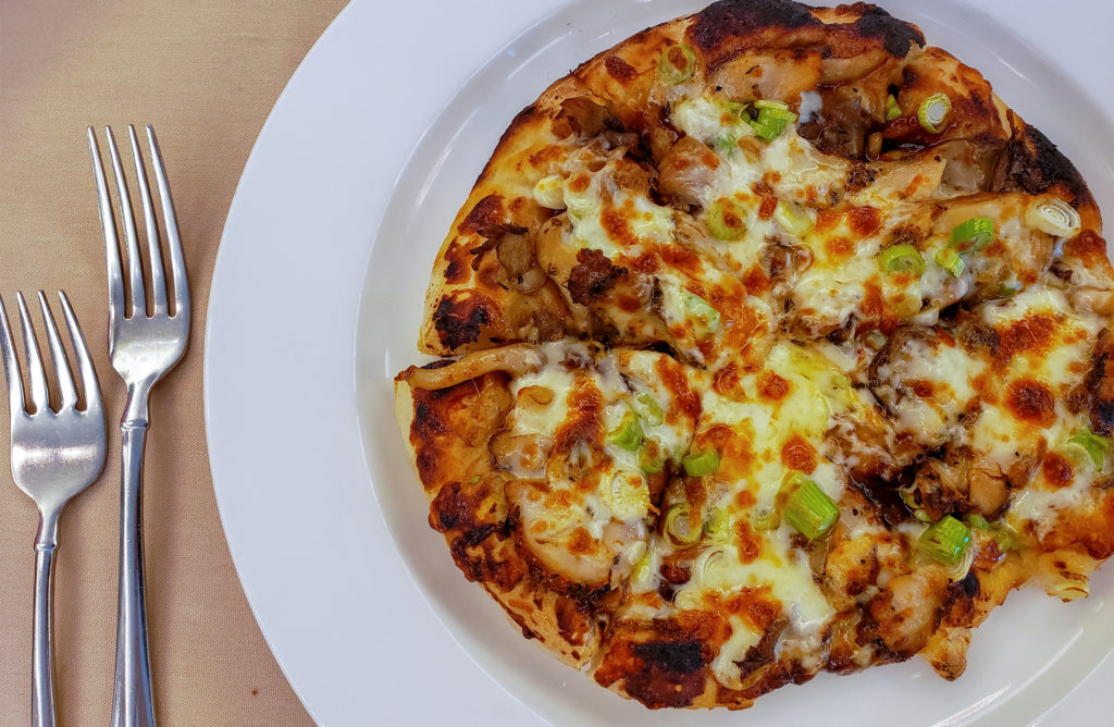 Smoked chicken pizza with jack cheese, oyster mushrooms, green onions, hoisin at the SRJC Culinary Cafe in Santa Rosa. Heather Irwin/PD