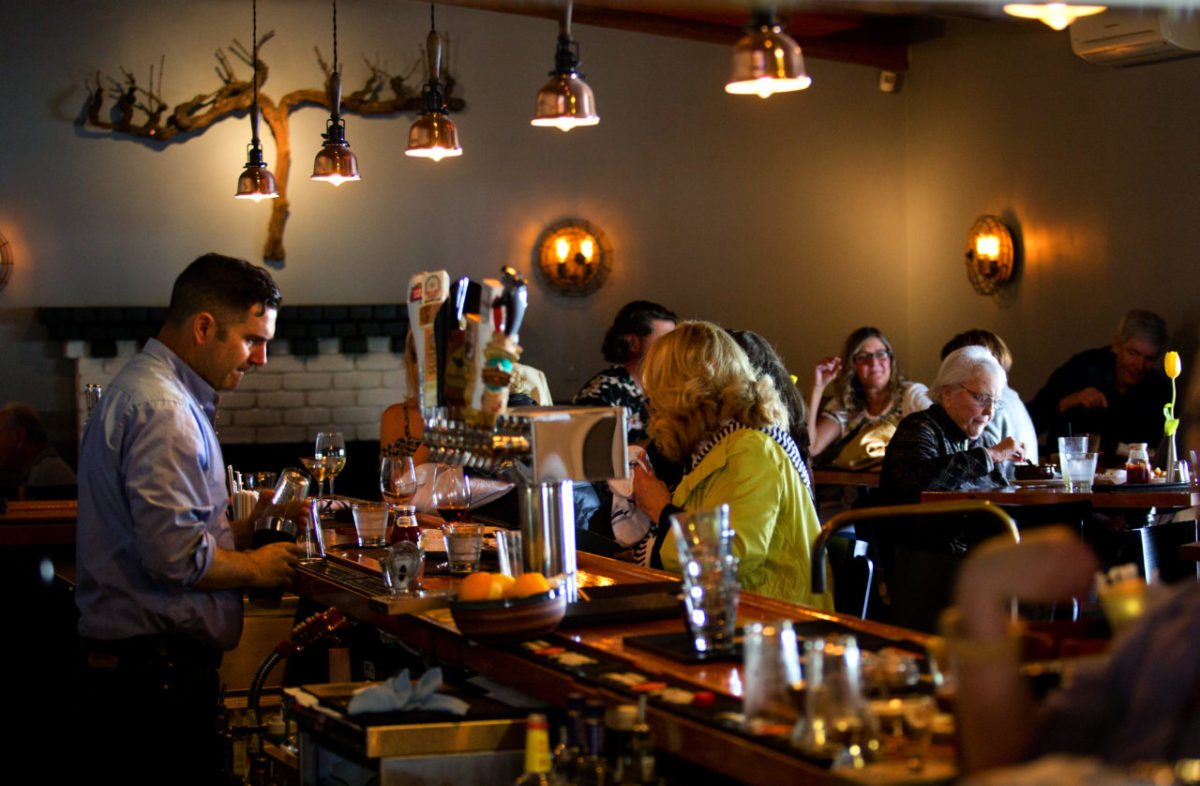 The busy bar in the late afternoon at the Salt & Stone, Kenwood's gathering place. (photo by John Burgess/The Press Democrat)