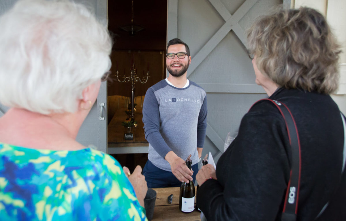 George Urquiola pours wine for guests at La Rochelle winery during Savor Sonoma Valley 2017 Saturday, March 18, 2017. Seventeen area wineries participated in the barrel tasting event. (Jeremy Portje / For The Press Democrat)