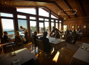The remodeled dinning room at The Harbor House Inn in Elk uses the warmth of redwood found in groves along the Mendocino coast. (John Burgess/The Press Democrat)