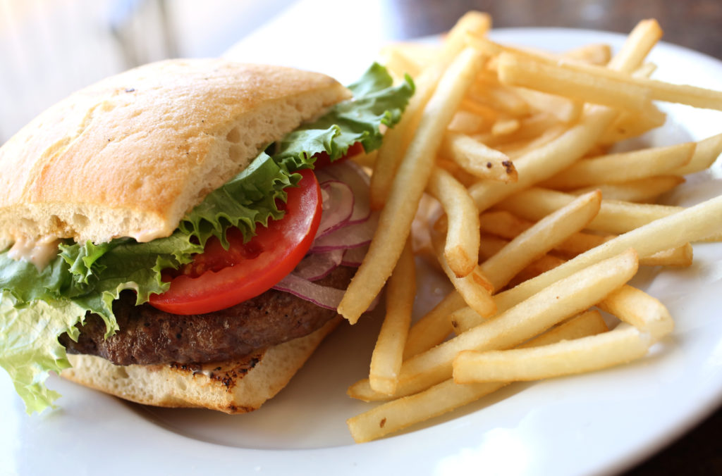 Angus Beef Burger served at The Hole in the Wall Restaurant in Sebastopol, Friday, July 11, 2014. (Crista Jeremiason / The Press Democrat)