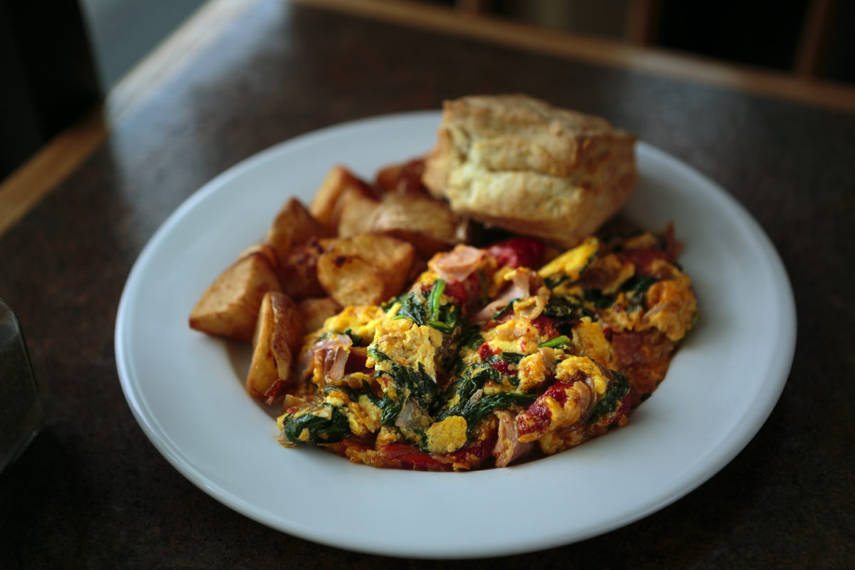 Biscuit and gravy with sausage, mushroom hash and eggs, hole in the wall scramble, and dutch baby pancake at Hole In The Wall in Sebastopol. (Chris Hardy / Sonoma Magazine)