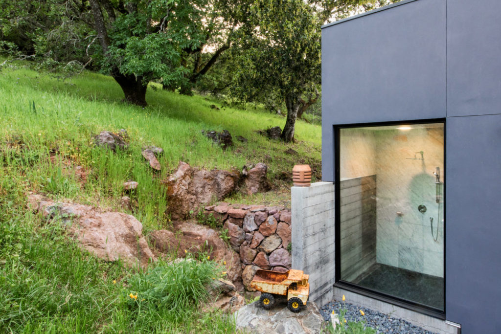 Outside view of master shower with Tonka truck which represents Kates hometown of Tonka Bay, Minnesota.