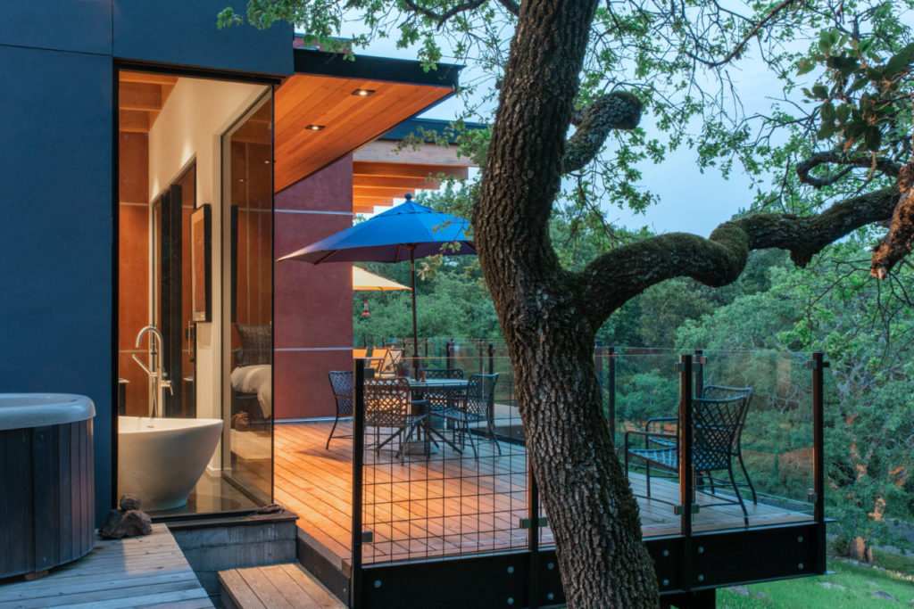 Exterior view of master bathroom and deck.